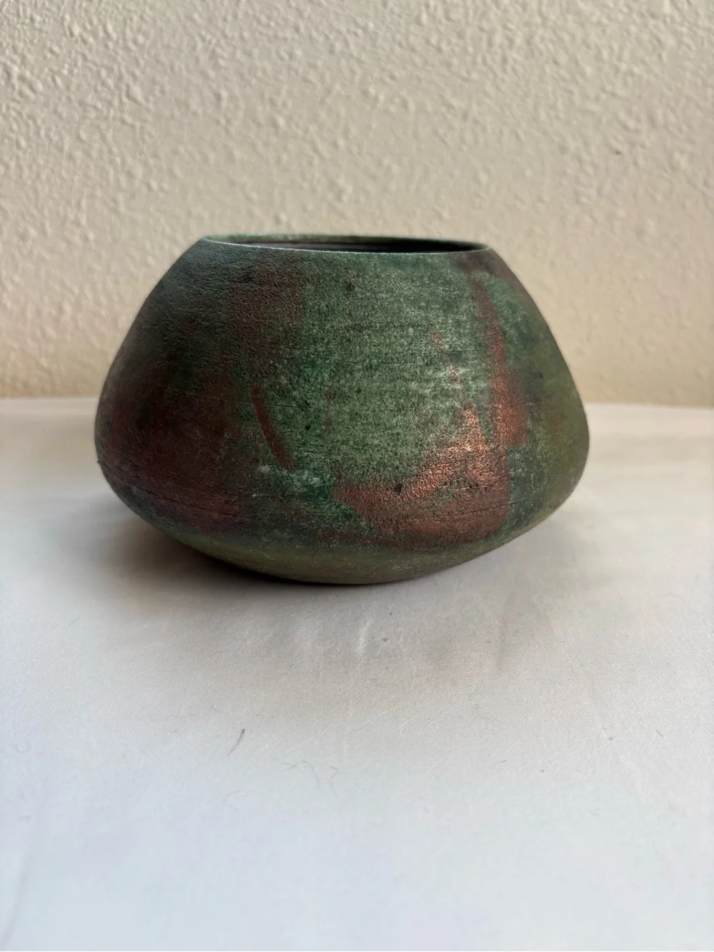 Green pottery vase